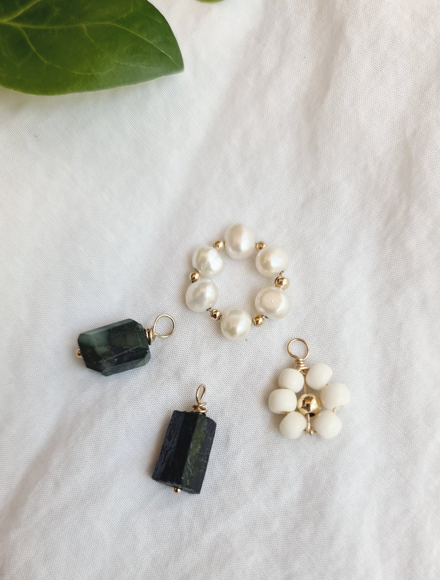 Interchangeable charms for hoops