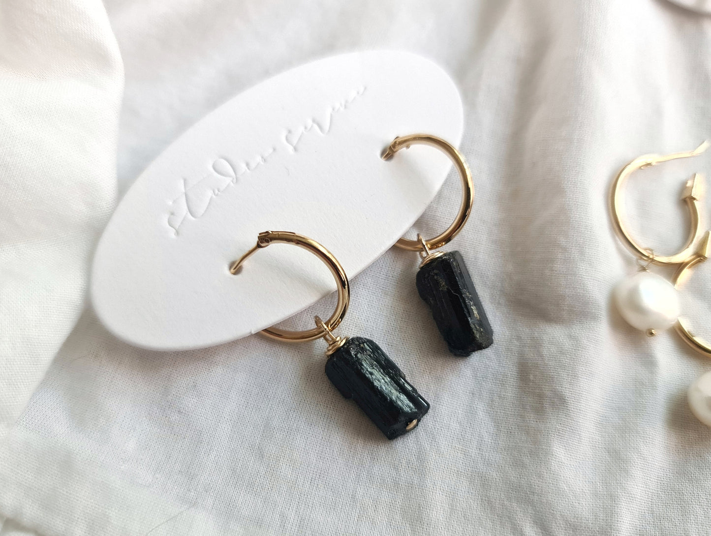 Interchangeable charms for hoops