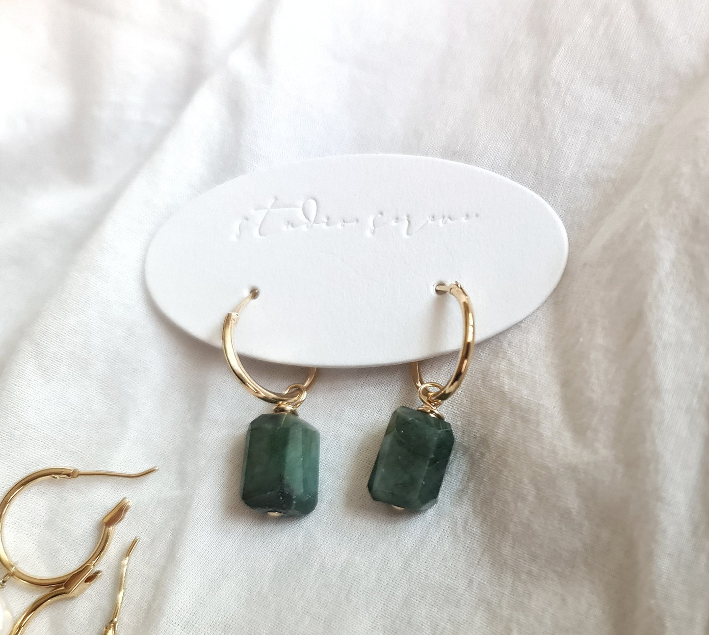 Interchangeable charms for hoops
